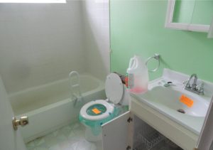 Bathroom in original condition before updates in Roebling NJ home