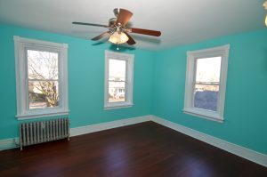 Renovated bedroom with hardwood floors and fresh paint in Roebling NJ