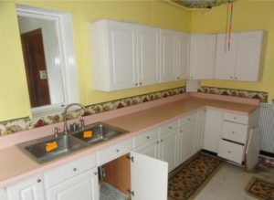 Kitchen in original condition before renovation in Roebling NJ home