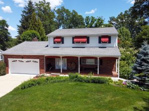 Colonial home in Hamilton NJ with front lawn and clean exterior presentation