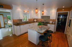 Kitchen in Hamilton NJ with custom cabinetry, island, and open layout