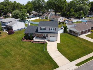 Drone view of Hamilton NJ neighborhood showing backyard spacing lot sizes and residential layout