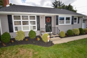 Well maintained home exterior in Hamilton NJ with porch and landscaping