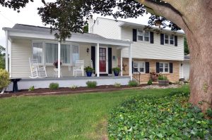 Well maintained home exterior in Hamilton Township NJ with porch and landscaping