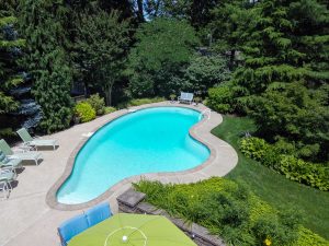 Private backyard with inground pool and landscaping at a Hamilton Township NJ home