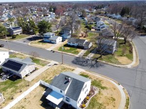 Aerial view of Hamilton Township NJ neighborhood showing homes streets and community layout