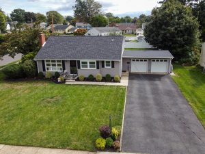 Aerial view of home with driveway and garage in Hamilton Township NJ