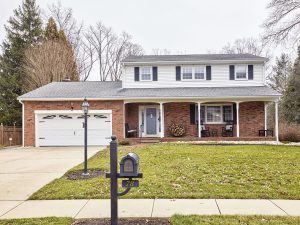 Colonial style home with front porch in a residential neighborhood in Hamilton Township NJ Hamilton Square section