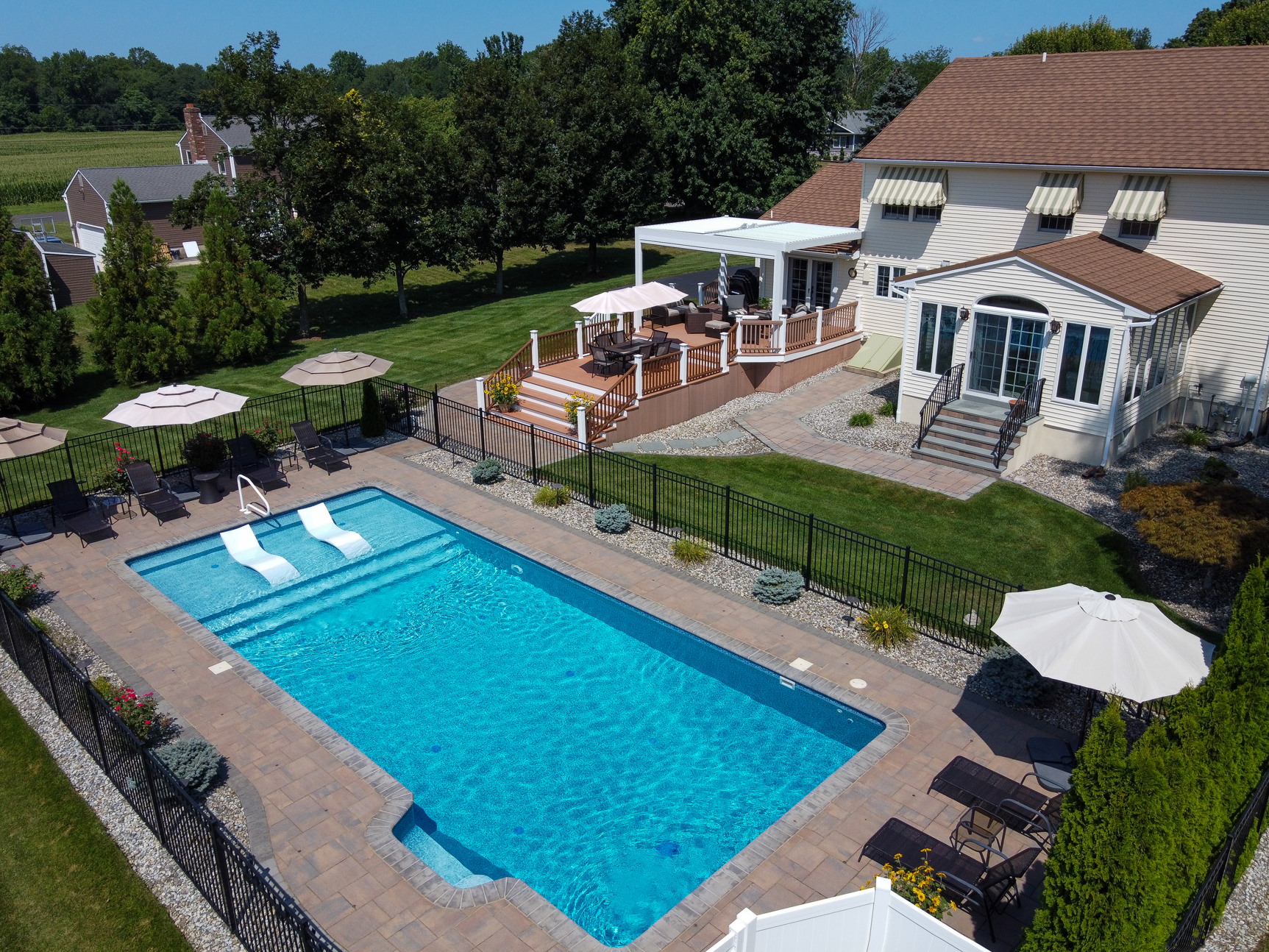 Aerial view of backyard with inground pool at a home in Hamilton Township NJ
