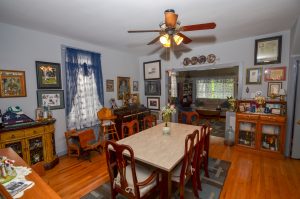 Dining room in a Roebling NJ twin home with hardwood floors, traditional layout, and connected living spaces