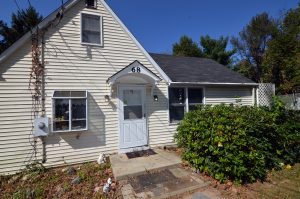 Front entry of Cape Cod home on Alexander Road in Hamilton NJ that was part of a family sale