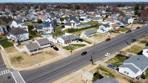 Aerial view of a residential neighborhood in Hamilton NJ showing multiple homes, streets, and surrounding properties