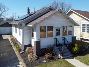 Hamilton NJ ranch home with rooftop solar panel system installed on a residential property
