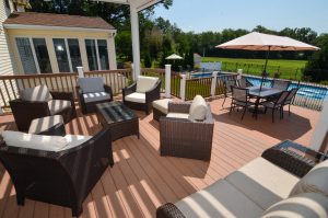 Outdoor deck seating area overlooking a backyard in Hamilton Township New Jersey