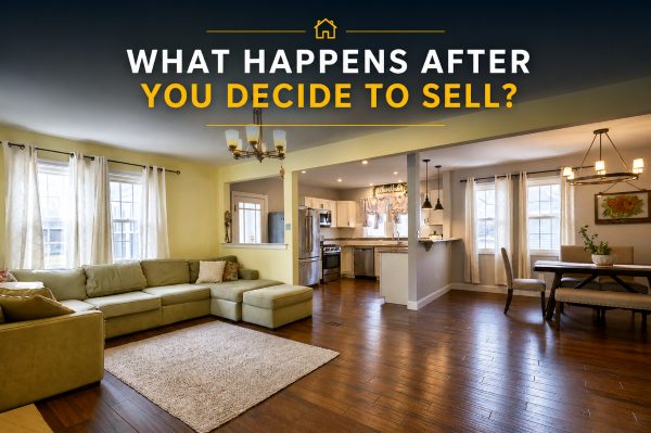 Open concept living, dining, and kitchen space in a Robbinsville NJ home with hardwood floors and natural light