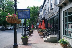 Historic downtown Bordentown City NJ featuring restaurants, outdoor seating, and the Thomas Farnsworth historical marker