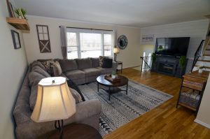 Comfortable living room in a Hamilton NJ home representing the financial decision of whether moving makes sense.
