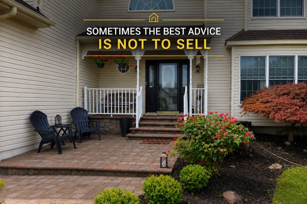 Covered front porch and landscaped entrance of a Hamilton NJ home representing the decision of whether selling is the right next step