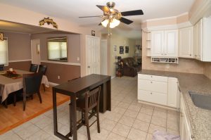 Open kitchen and dining area in a Yardville home in Hamilton Township NJ showing connected rooms, wide openings, and an easy flow into the adjoining living space.