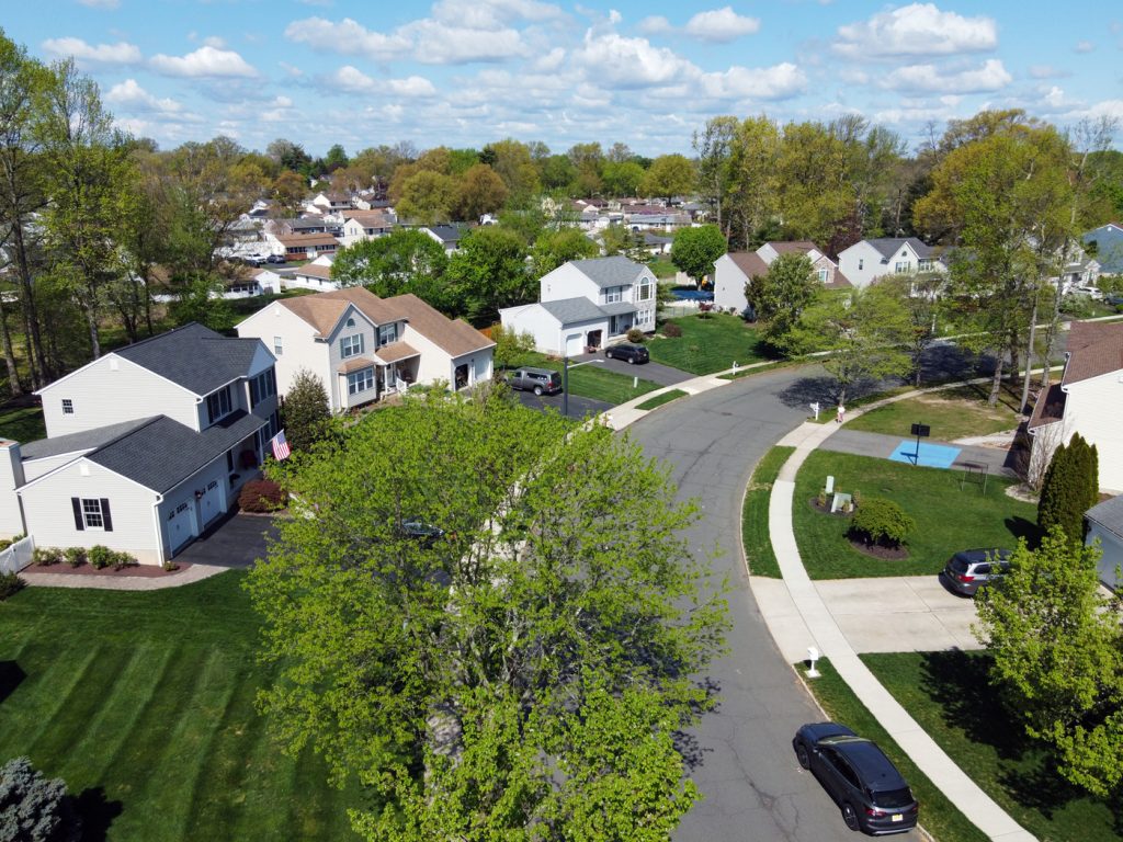Aerial view of a residential neighborhood in Hamilton Township NJ showing homes and streets in Mercer County