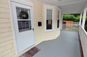 Covered front porch and entry of a home in the Island neighborhood of Trenton NJ.